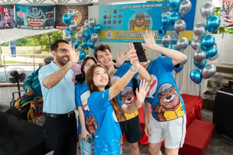 Creators filming at a community event activation